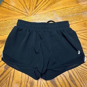 ASICS black running shorts size extra small waist drawstring back zipper pocket.